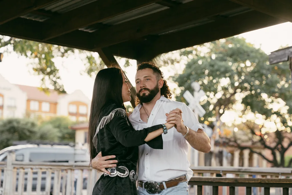 Engagement photography in the fort worth stock yards dancing around