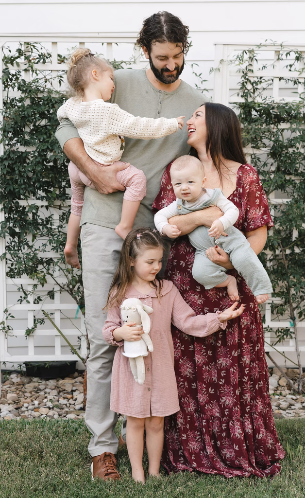 family in their backyard all together in texas