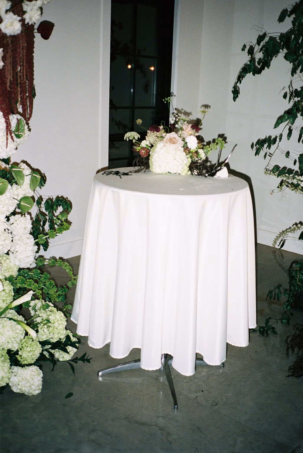 A detail shot of cake table on 35mm film at a texas wedding